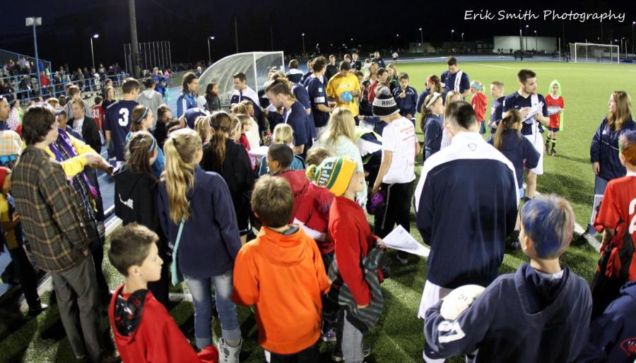 Post-match autographs in Spokane. (Erik Smith)