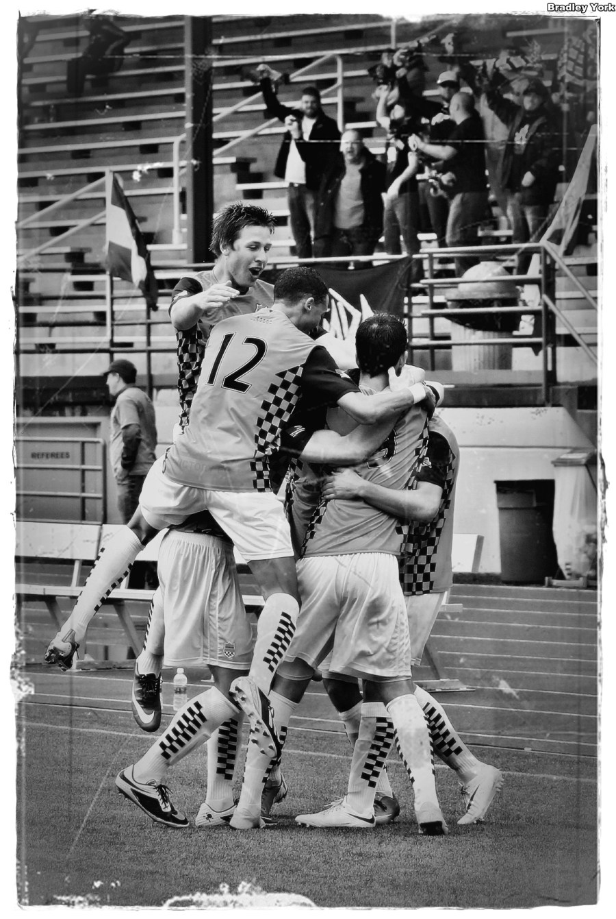 Goal, and victory for Vancouver as The Vanguard go wild in the background at Sunday's home opener. (Bradley York)