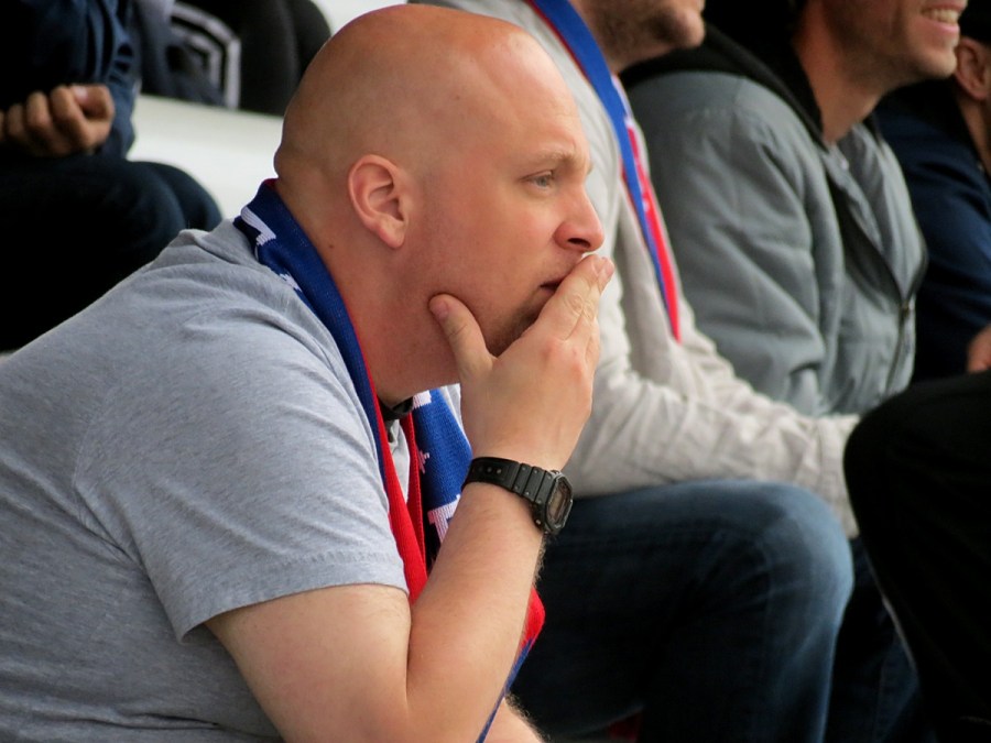 A scarf-wearing South Sound supporter watches intently in the club's Lakewood debut. (David Falk)
