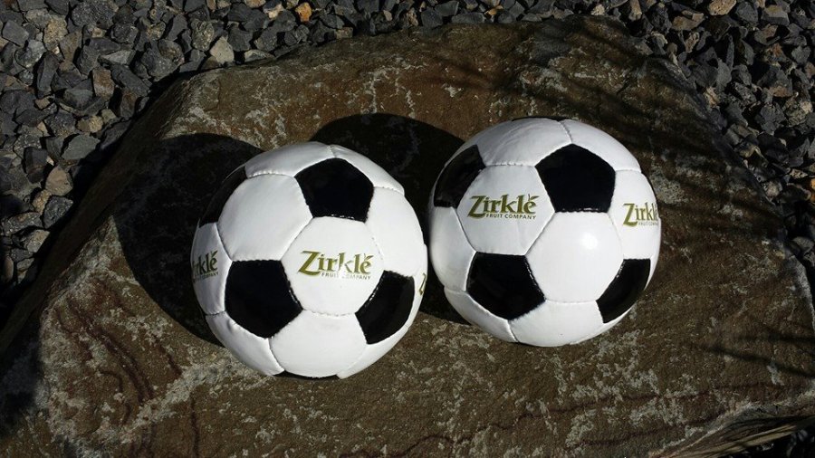 Zirkle Furit Company gave hundreds of balls away to kids after the match.
