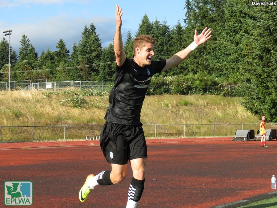 Jordan Jones raises his arms in joy after completing a first-half hat trick over a 13-minute spell. (David Falk)