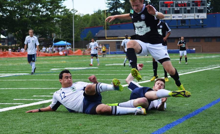 INTENSITY: This is quite an angle for a photo as the Hammers' attack is slowed down by two Stars players sliding for the ball. (Facebook)