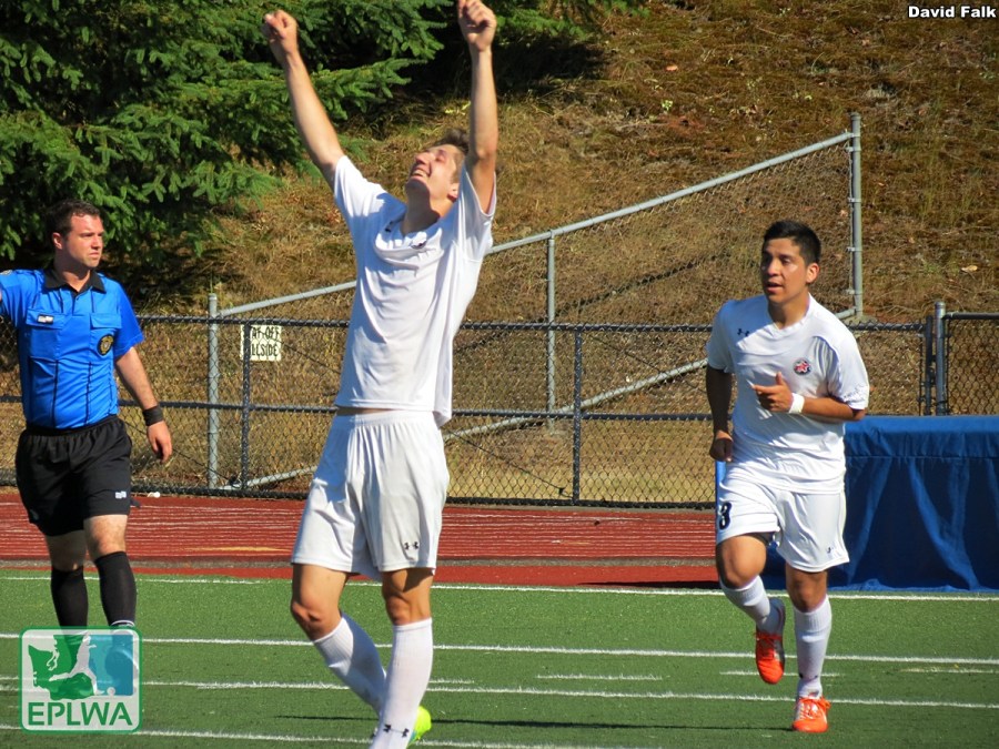 Colin Ralston raises his arms after completing his hat trick, the first in club history. (David Falk)