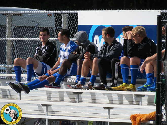 Kitsap Pumas players watch the Olympic Force play in a pre-season tournament. (David Falk)